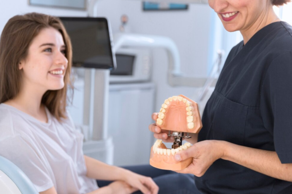 Restoring Your Smile: Comparing Root Canal Treatment and Teeth Implants